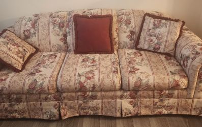 Gently used love seat and couch.