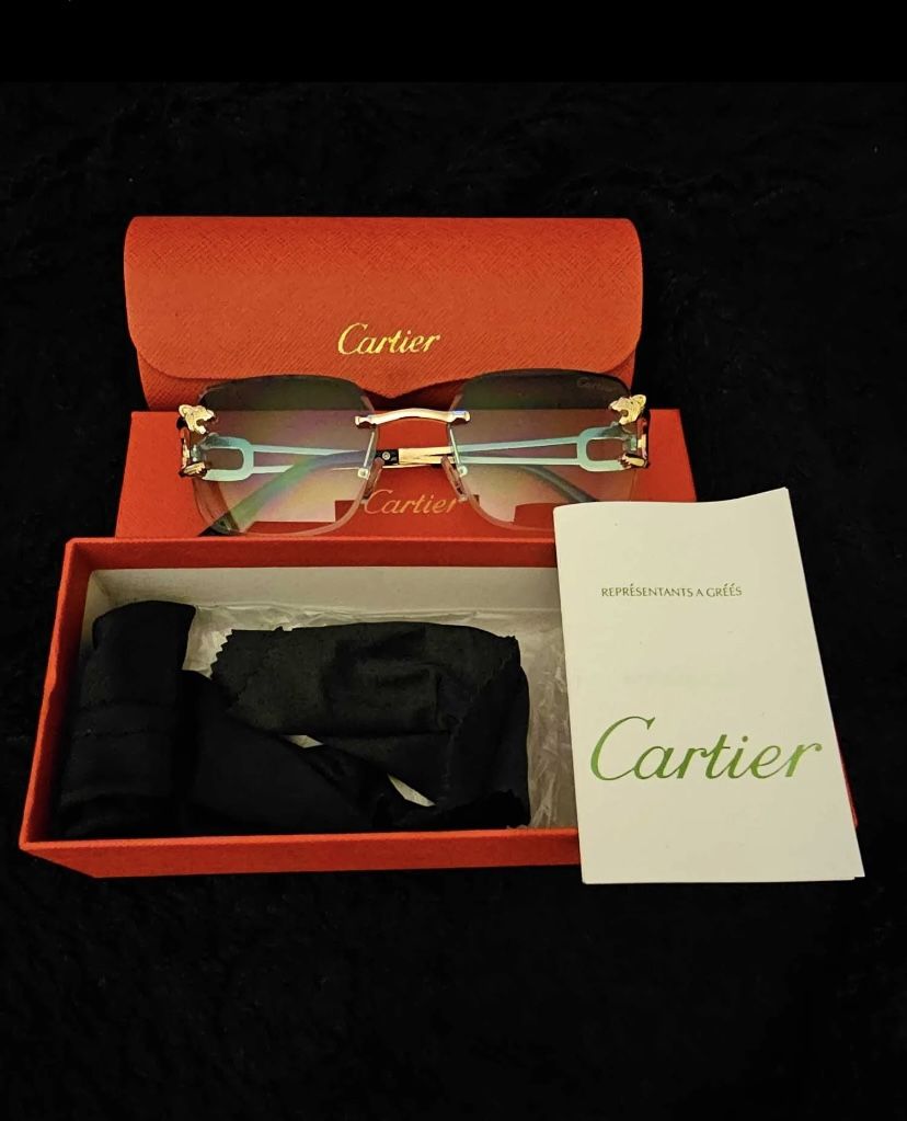 Black Cartier With Gold Frames