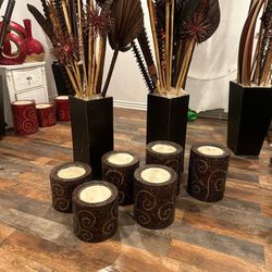 decorative vases with dried nature and mosaic candles