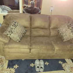 Ashley's Furniture New Couch With Pull Out Bed Never Used.