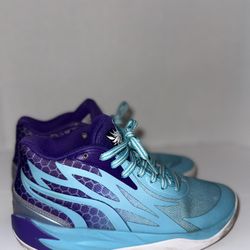 Puma LaMelo Ball MB.02 Queen City Fade  Size 5y  No box  Stylish sneakers featuring a vibrant blue and purple design. Perfect for adding a pop of colo