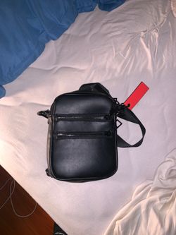 Black leather satchel (similar to Louis)