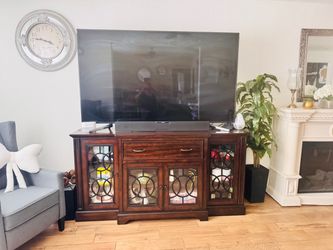Dark Wood TV Console with Glass Cabinet Doors