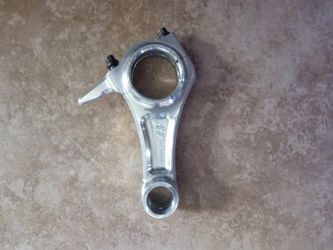 Arc connecting rod for a 212 predator