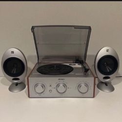 JENSEN JTA-220 3-Speed Turntable with AM/FM Stereo Receiver 
2 KEF HTS2001 Egg Satellite Speakers