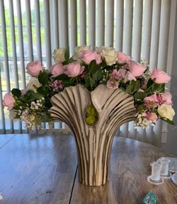 Pink floral arrangement artificial