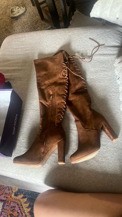 Brown knee high boots