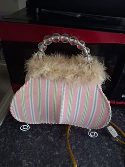 Lamp made like purse