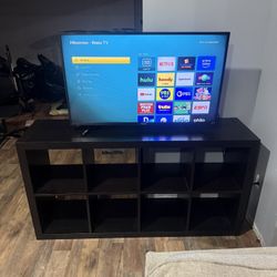 3 Roku TVs With A TV Stand 