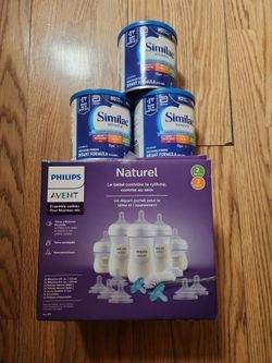 Philip's bottle gift set and three cans of formula