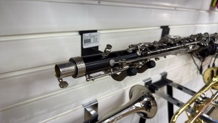 Bass clarinet with additional pieces and case