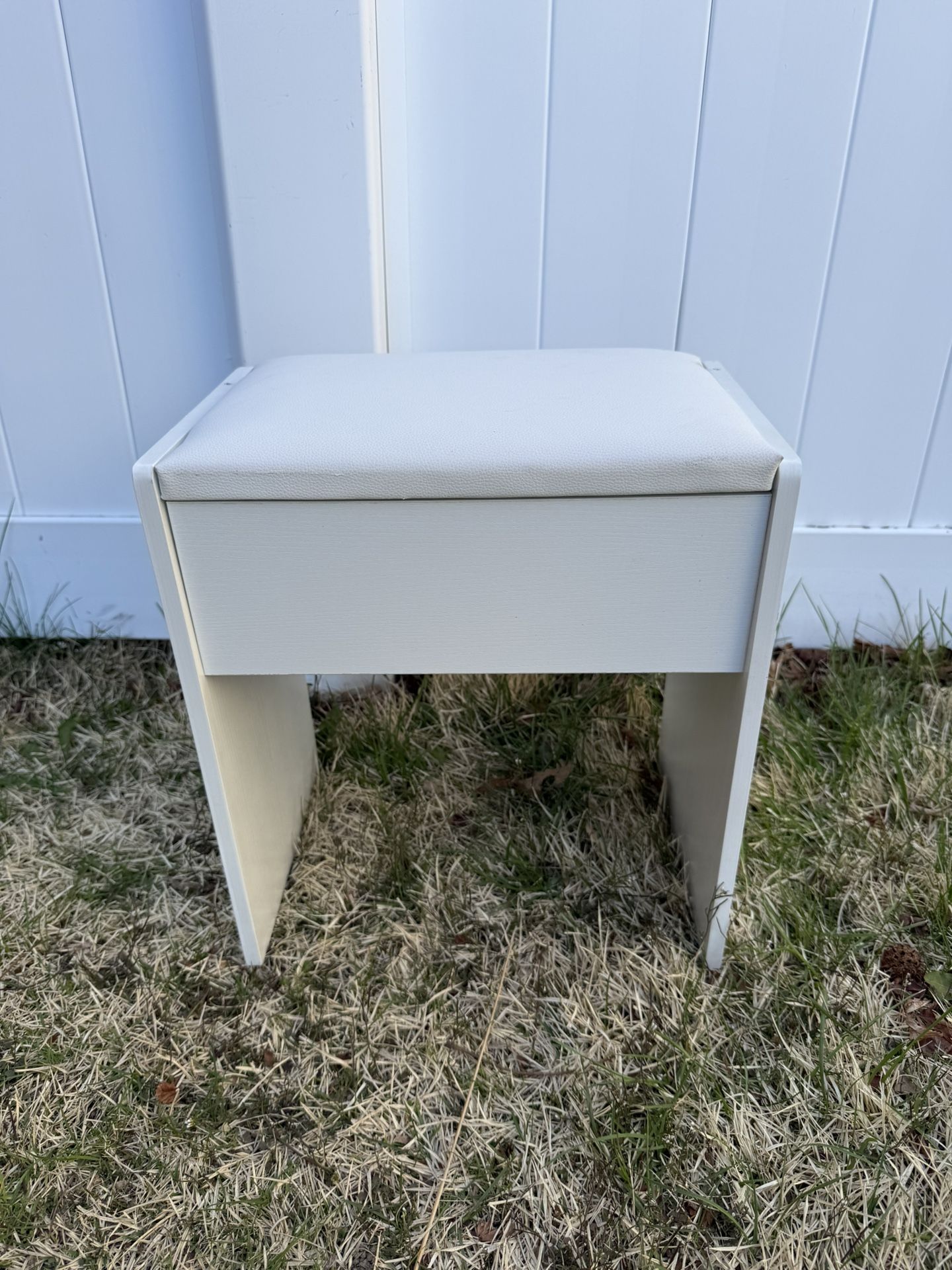 Small wood stool with padded seat