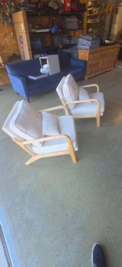 Two small white chairs