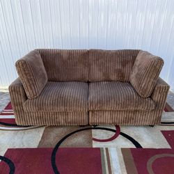 Soft Plush Modular Sectional Loveseat Sofa. Delivery Available for an additional cost. In great condition. Dimensions:78”x74”. Price 250$. 