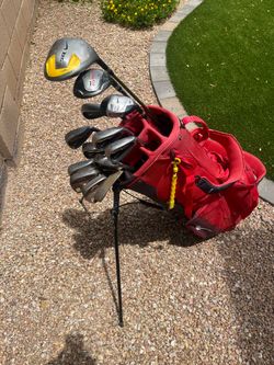 Nike Ignite irons and woods, Callaway wedges, Nike bag.