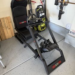 Next Level racing sim with Logitech Wheel/Pedal hub