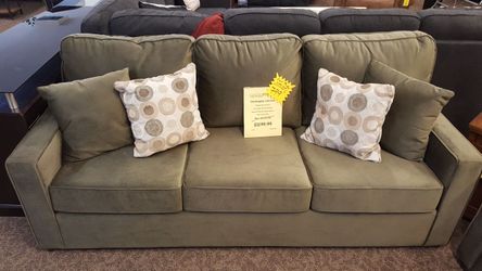 Green sofa and love seat set