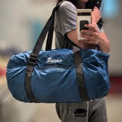 Wild Kiwi New Zealand Packable Ultralight Large Duffle Bag. Holds 55 Lbs, 26x16". Adjustable Straps, lockable Double Zip. Zippered Side Pocket. Waterp