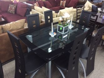 Glass dining table with 6 chairs