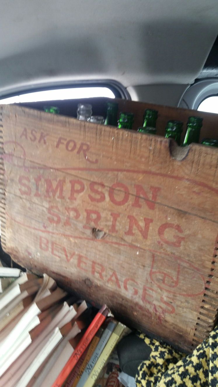 Simpson Springs soda crate and bottles