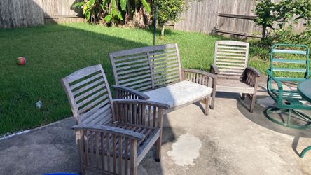 Outdoor wooden patio chairs and bench