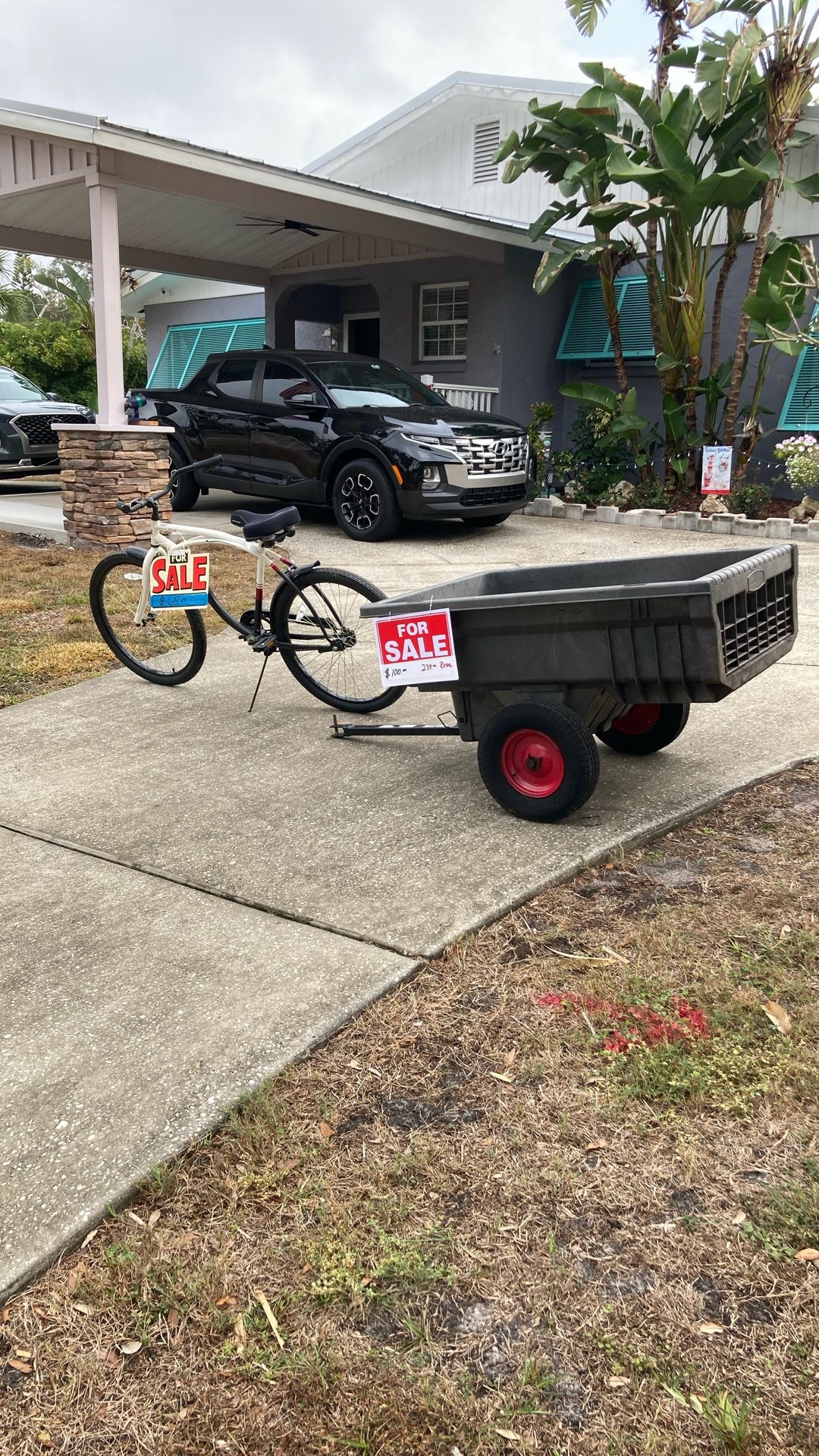 New bike 65.00. Lawn Tractor Trailer 100.00
