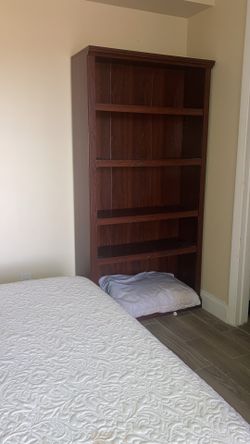 Brown wooden book case