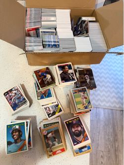 Box of baseball cards different brands different years 80s 90s