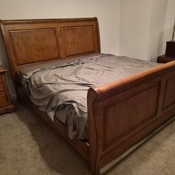 King size bed frame, head board/sideboard, brand new king size mattress with low profile box spring, matching night stand and touchlamp with shade