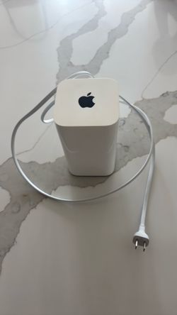 Apple Airport Router and Cords.