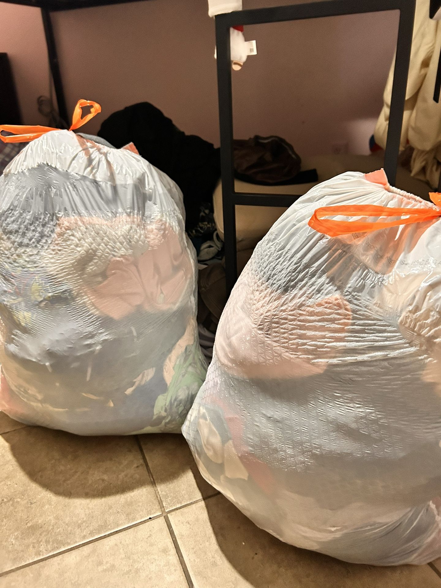 Two Bags Full Of Girl Clothes