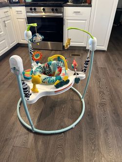 Fisher price bouncing seat activity center