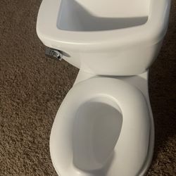 Super Clean Potty Barely Used  (never Pooped In It) 