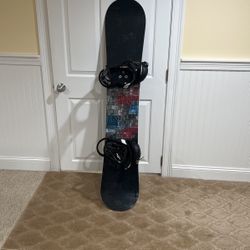 Burton snowboard W/ Boots, Helmet and Carry Bag