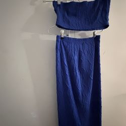 blue textured tube top and a matching midi skirt