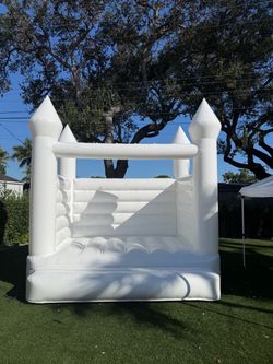 Selling white bounce house