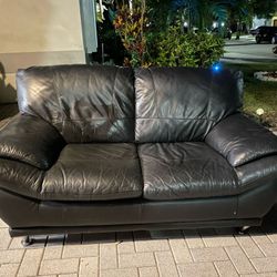 Leather Italian Love seat W/ Chrome Legs 