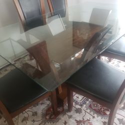 brown wood glass dining table