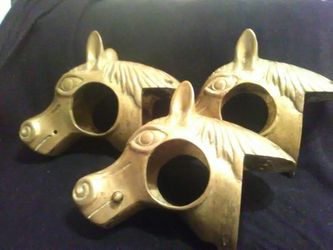 Brass horse head brackets