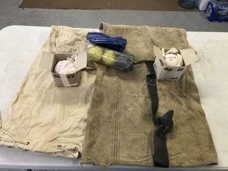 2 softball equipment bags, 3- tennis balls, small glove, 2 New Dudley 12” softballs.