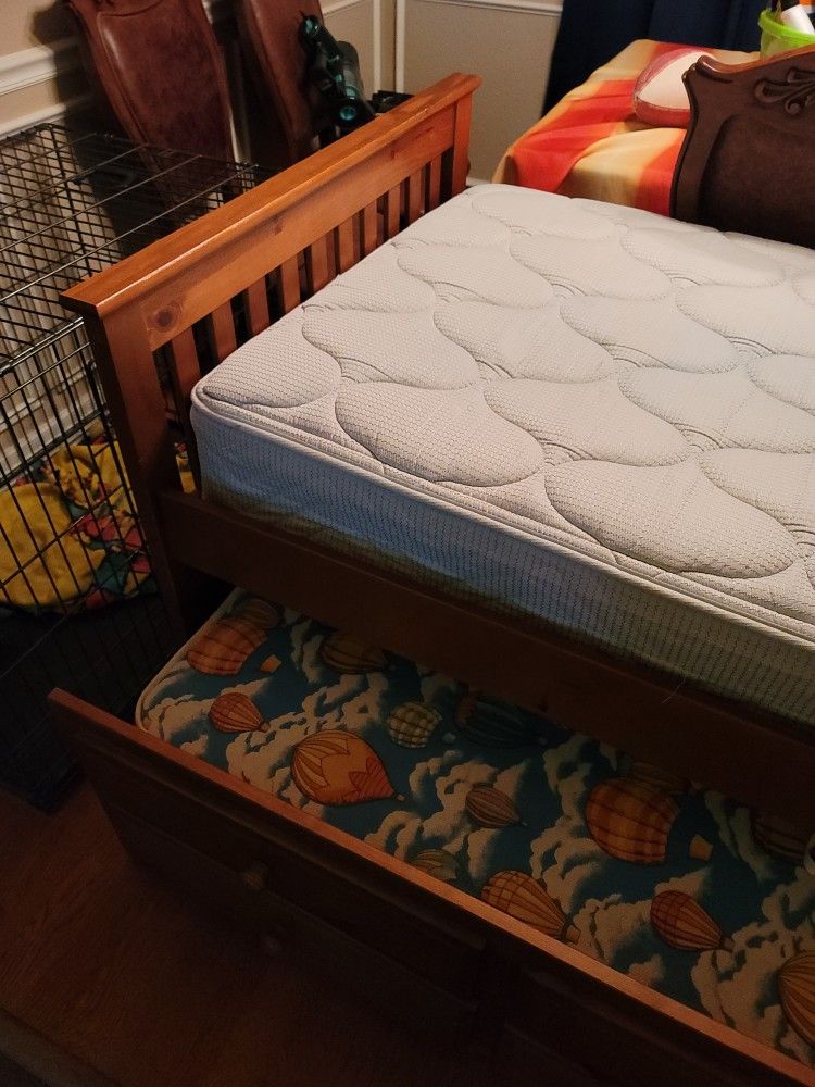 Twin Bed With Slide Out Mattress With Three Drawers