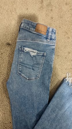 Ripped flared jeans