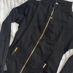 Lulu Lemon Black And Gold Zip up Size Medium 
