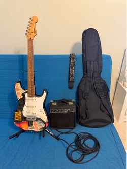 Squier Strat by fender and amp