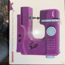 Janome Purple Thunder Sewing Machine With Fabric 