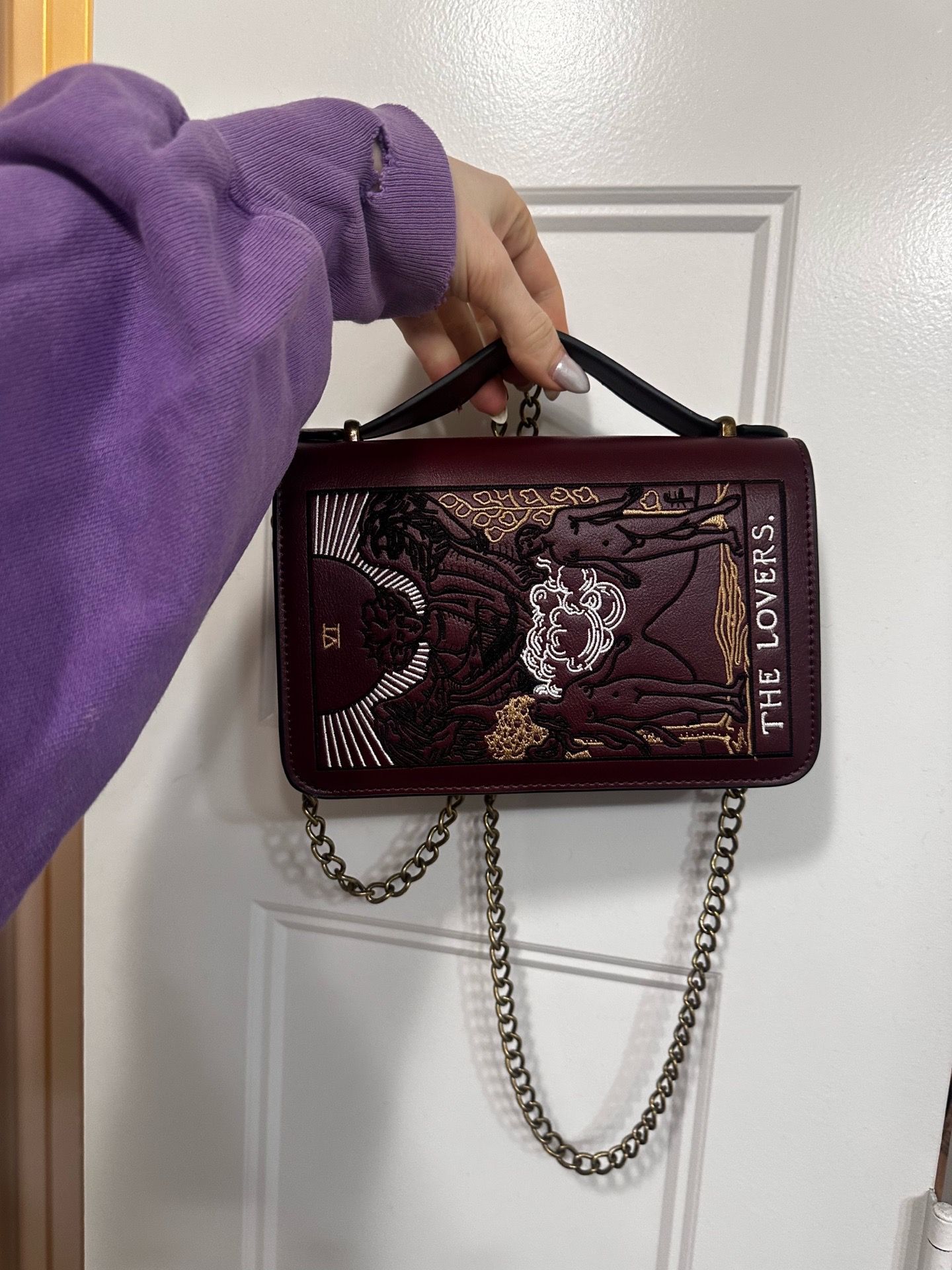 Disturbia “The Lovers” crossbody bag