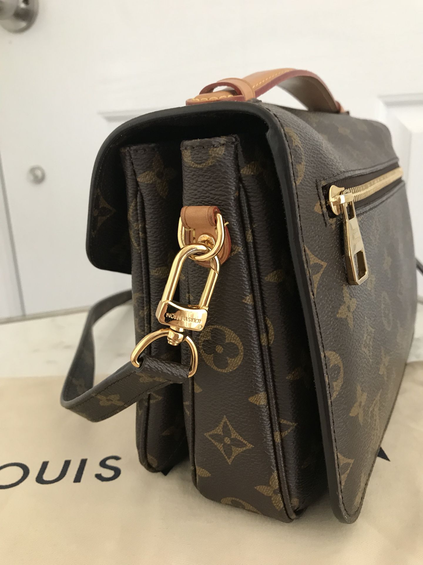 Louis Vuitton Monogram Empreinte Pochette Clutch Crossbody Bag for Sale in  West Hollywood, CA - OfferUp