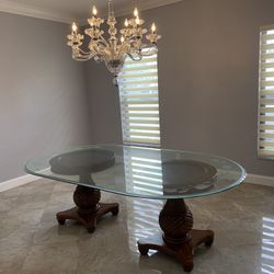 Beautiful Oval Glass Top With Its 2 Classy Solid Wood  Table Bases.