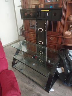 Glass shelved TV stand.