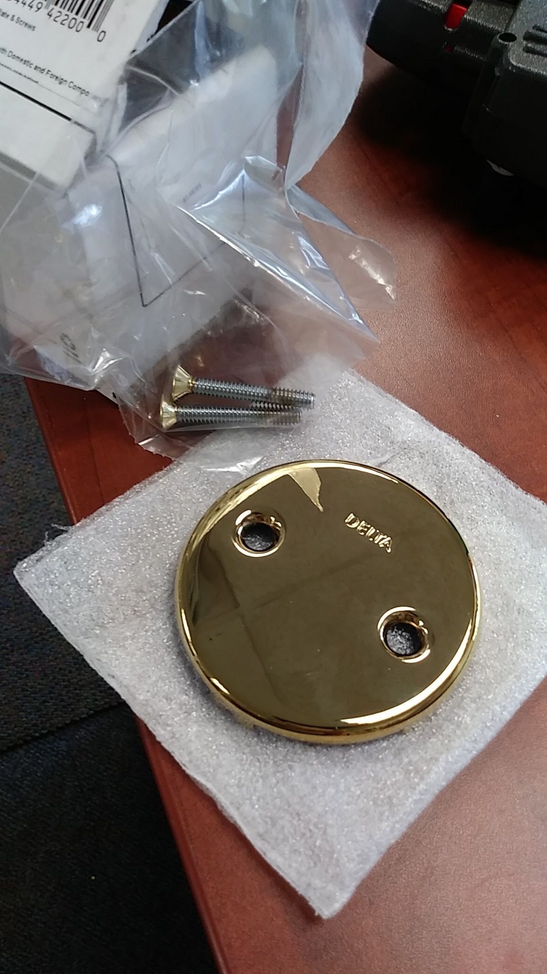 Delta overflow plate and screws